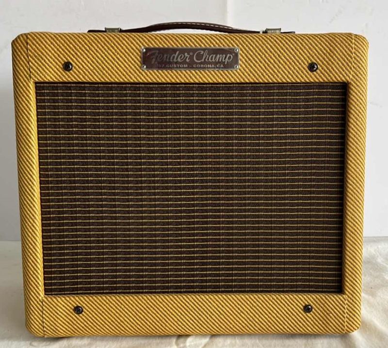 Photo 3 of FENDER '57 CUSTOM CHAMP TUBE GUITAR AMP W LACQUERED TWEED  (13.5” x 7” H12”)