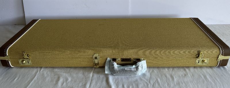 Photo 1 of FENDER CLASSIC SERIES WOOD STRAT/TELE GUITAR CASE TWEED PLUSH RED LINING