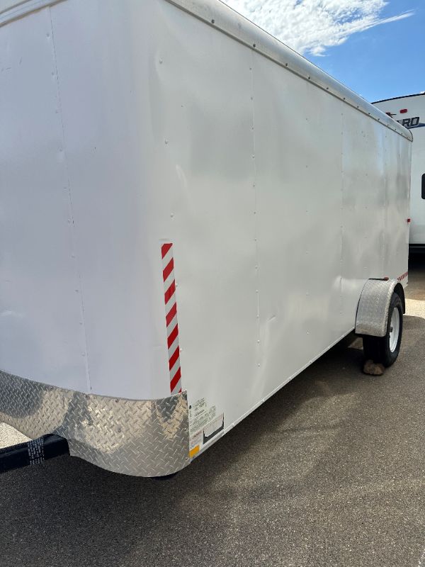 Photo 4 of 6' x 14' WHITE METAL ENCLOSED 2010 CARGO TRAILER W RAMP BACK GATE, SIDE DOOR. TIRES EXCELLENT CONDITION (SPARE TIRE INCLUDED) INTERIOR HEIGHT 75" - CLEAR TITLE
