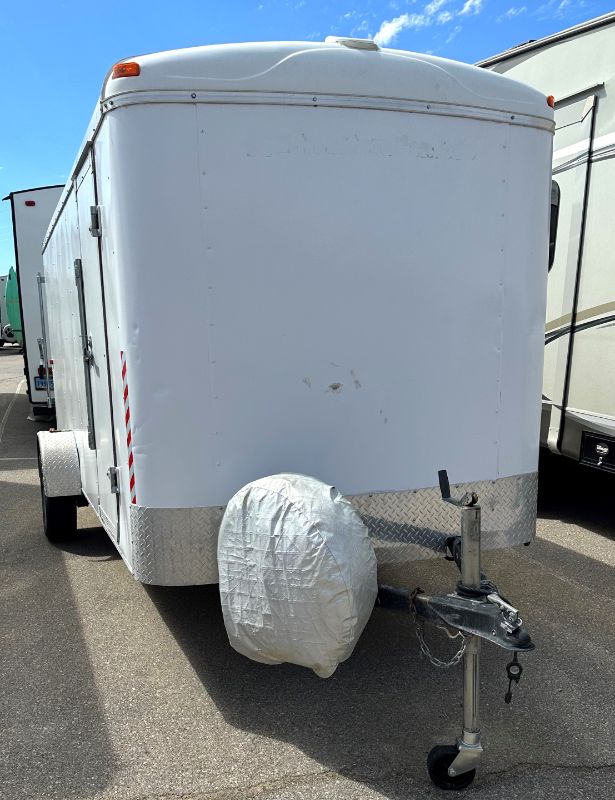 Photo 1 of 6' x 14' WHITE METAL ENCLOSED 2010 CARGO TRAILER W RAMP BACK GATE, SIDE DOOR. TIRES EXCELLENT CONDITION (SPARE TIRE INCLUDED) INTERIOR HEIGHT 75" - CLEAR TITLE