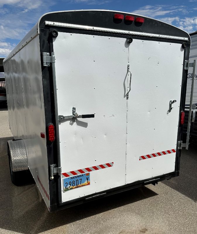 Photo 8 of 6' x 14' WHITE METAL ENCLOSED 2010 CARGO TRAILER W RAMP BACK GATE, SIDE DOOR. TIRES EXCELLENT CONDITION (SPARE TIRE INCLUDED) INTERIOR HEIGHT 75" - CLEAR TITLE