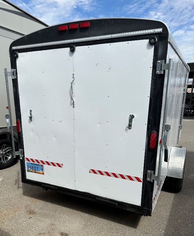 Photo 9 of 6' x 14' WHITE METAL ENCLOSED 2010 CARGO TRAILER W RAMP BACK GATE, SIDE DOOR. TIRES EXCELLENT CONDITION (SPARE TIRE INCLUDED) INTERIOR HEIGHT 75" - CLEAR TITLE