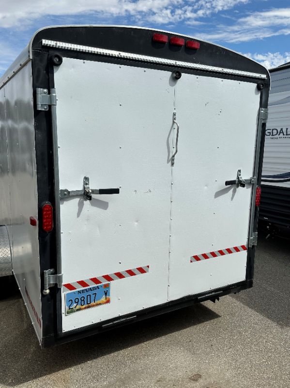Photo 7 of 6' x 14' WHITE METAL ENCLOSED 2010 CARGO TRAILER W RAMP BACK GATE, SIDE DOOR. TIRES EXCELLENT CONDITION (SPARE TIRE INCLUDED) INTERIOR HEIGHT 75" - CLEAR TITLE