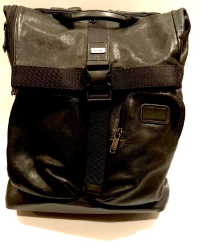 Photo 1 of TUMI BRIEF PACK BLACK LEATHER RETAILS $ 725.00