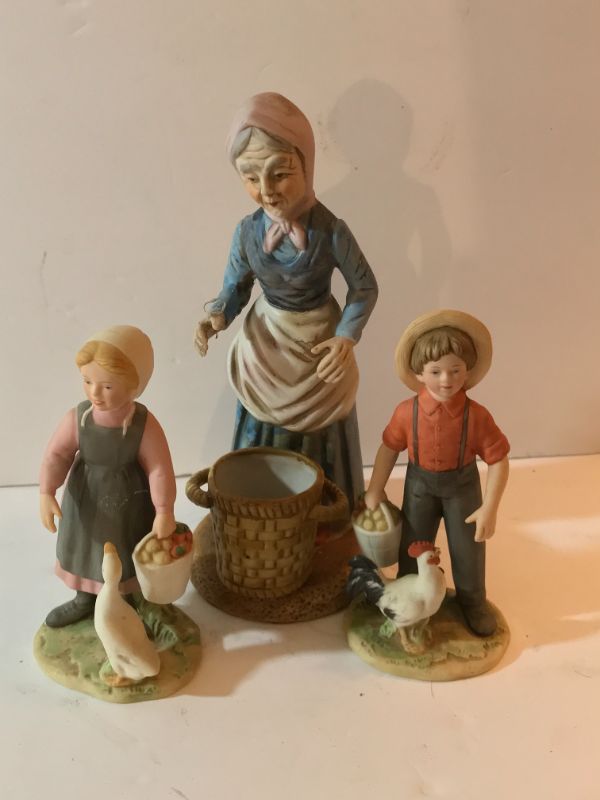 Photo 1 of MINIATURE PORCELAIN FAMILY OF FARMERS 8” TALL