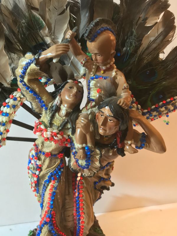 Photo 1 of NATIVE AMERICAN INDIAN FAMILY STATUE WITH FEATHERS