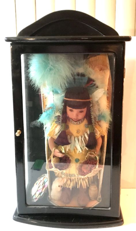 Photo 2 of ASHLEY BELLE NATIVE AMERICAN PORCELAIN DOLL 15” WITH WOODEN BOX 11” x 6” x 22”