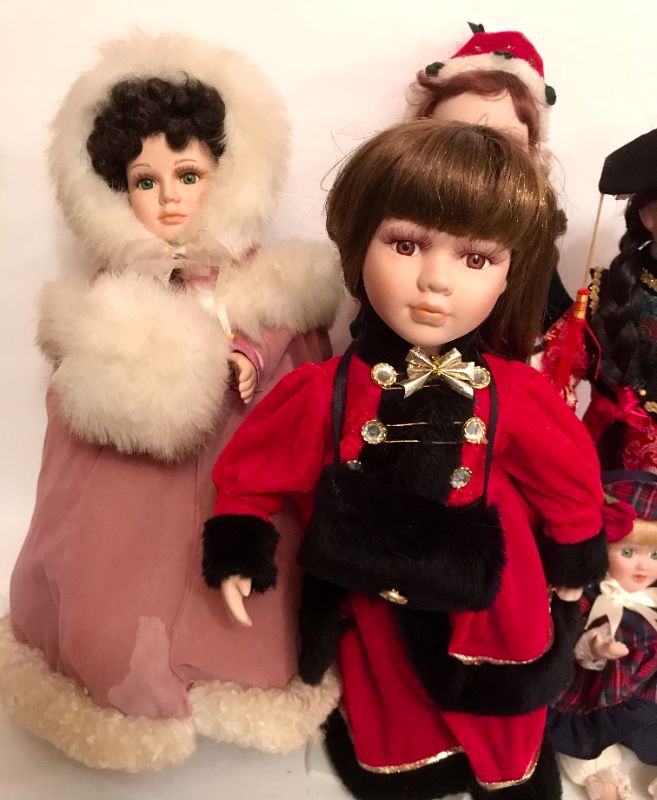 Photo 3 of COLLECTION OF PORCELAIN DOLLS IN DIFFERENT ATTIRE