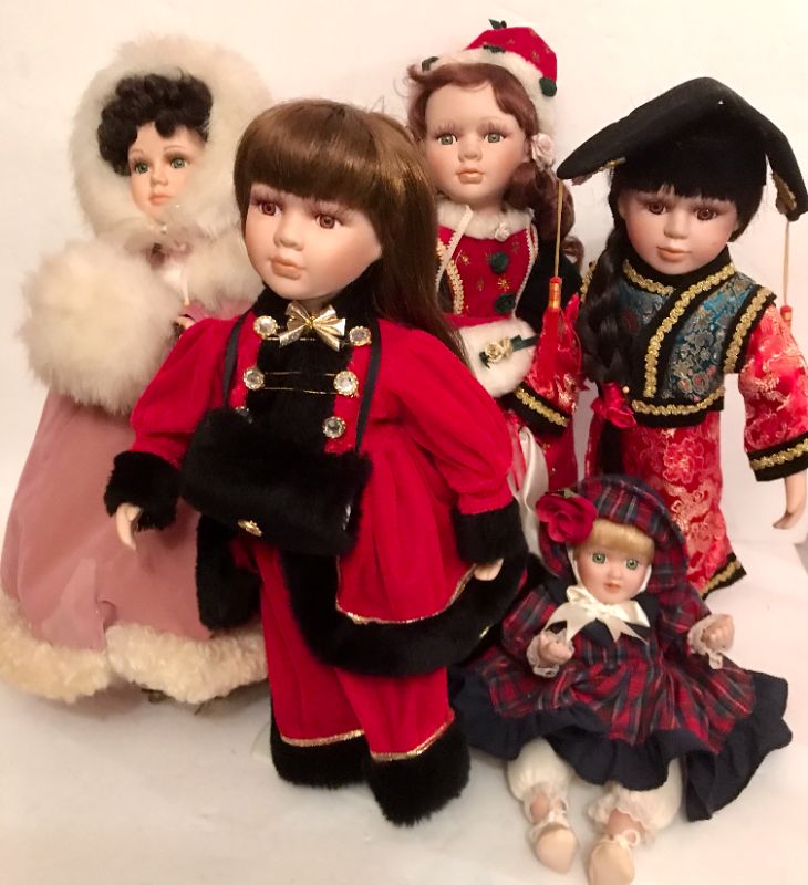 Photo 1 of COLLECTION OF PORCELAIN DOLLS IN DIFFERENT ATTIRE