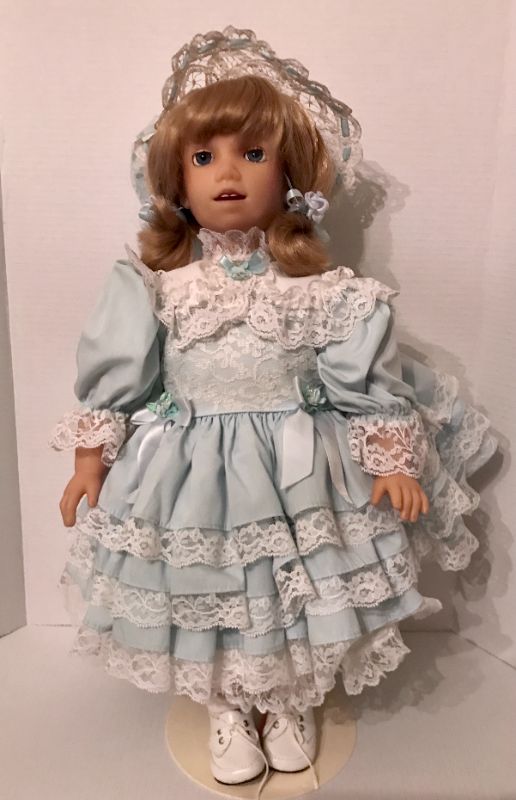 Photo 1 of VINTAGE 24" PORCELAIN DOLL 