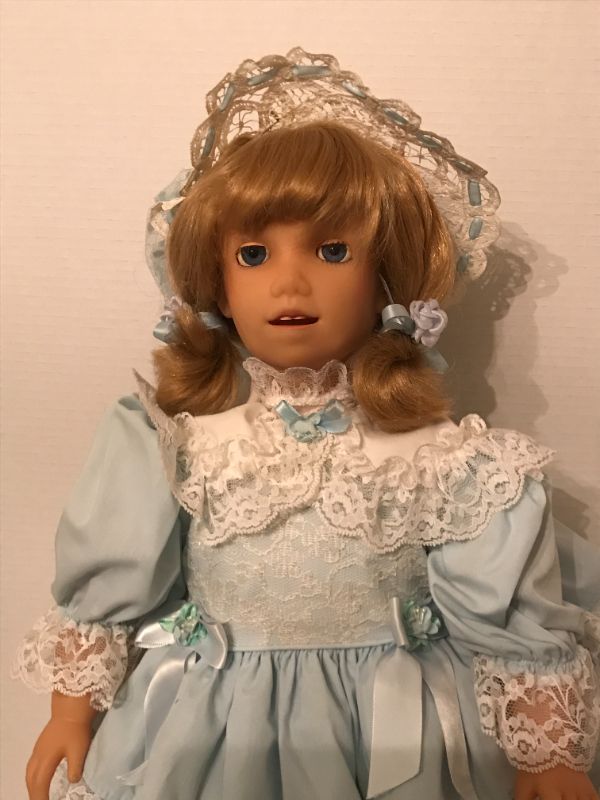 Photo 3 of VINTAGE 24" PORCELAIN DOLL 