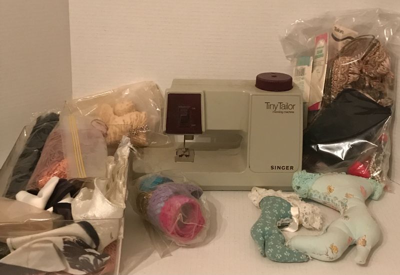 Photo 1 of SINGER TINY TAILOR MENDING MACHINE / SEWING SUPPLIES AND MORE