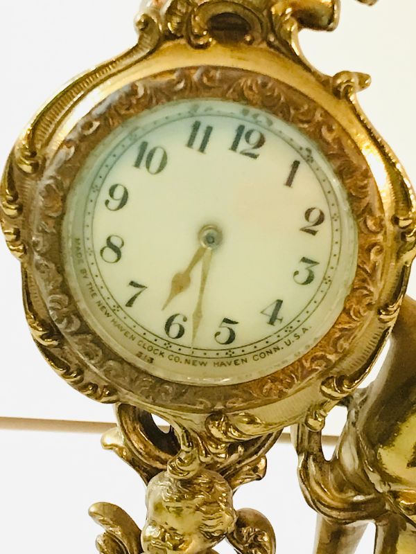 Photo 3 of ANTIQUE NEW HAVEN CLOCK, CHERUB, CIRCA 1910s, GOLD ACCENTED 7.25” H