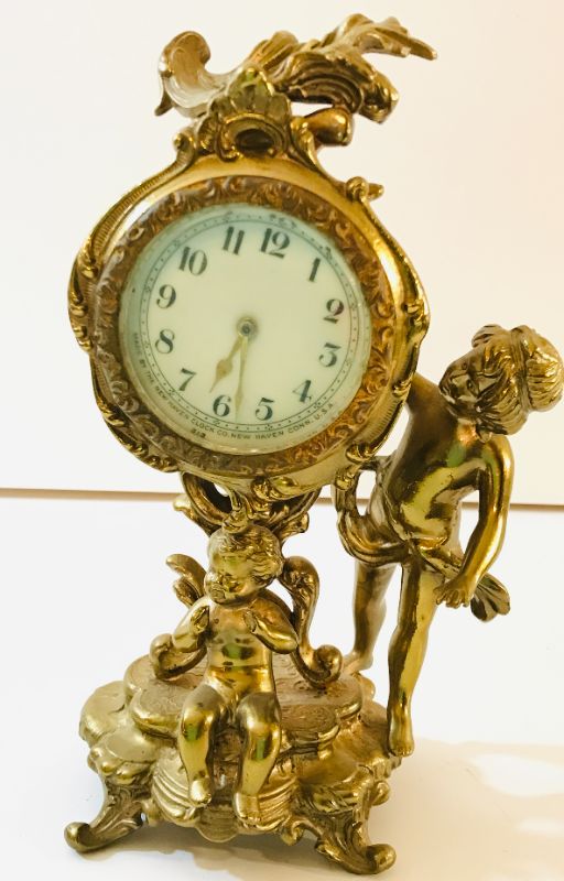 Photo 2 of ANTIQUE NEW HAVEN CLOCK, CHERUB, CIRCA 1910s, GOLD ACCENTED 7.25” H