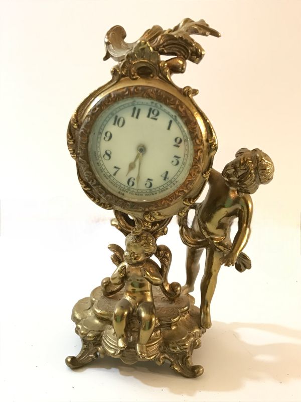 Photo 1 of ANTIQUE NEW HAVEN CLOCK, CHERUB, CIRCA 1910s, GOLD ACCENTED 7.25” H