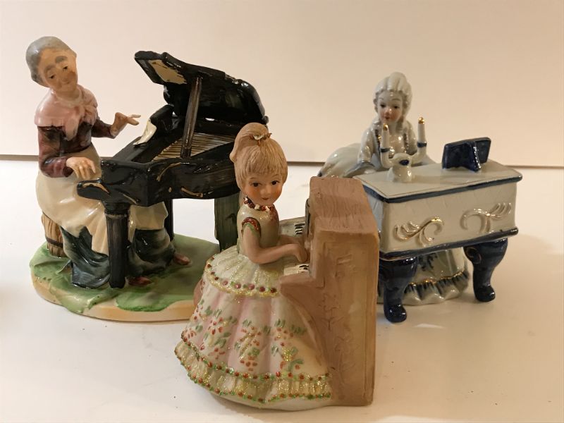 Photo 1 of GENERATIONS OF PIANIST PORCIELIN FIGURINES 