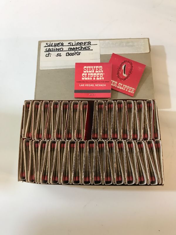 Photo 1 of VINTAGE LAS VEGAS CASINO SILVER SLIPPER MATCHES