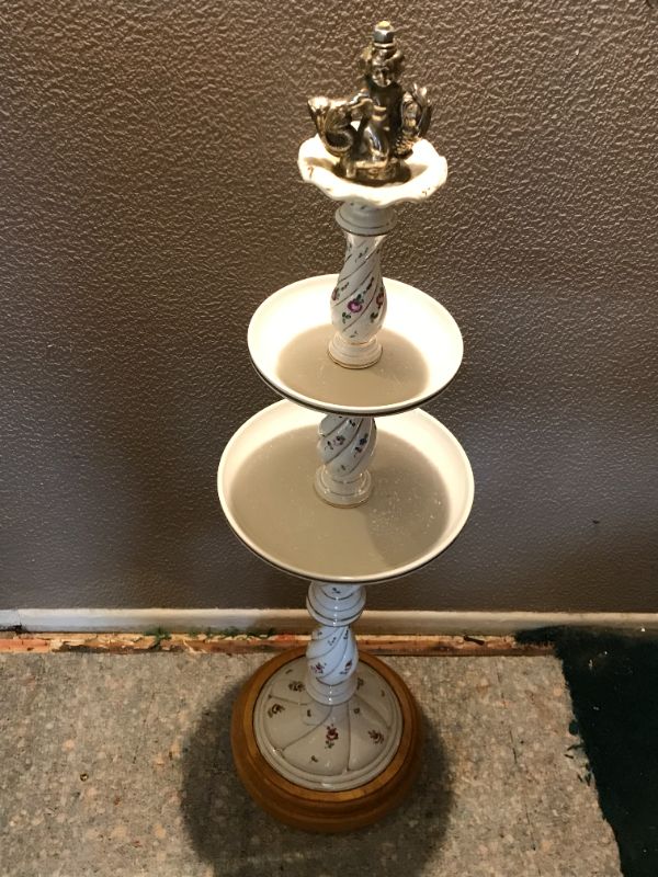 Photo 1 of LARGE CERAMIC & WOOD BASE TIERED STAND
41” H