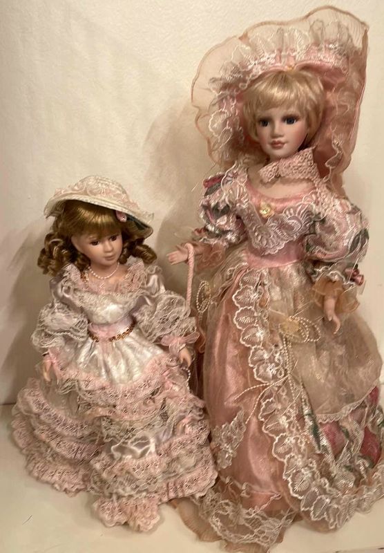 Photo 1 of VICTORIAN DRESSED PORCELAIN DOLLS