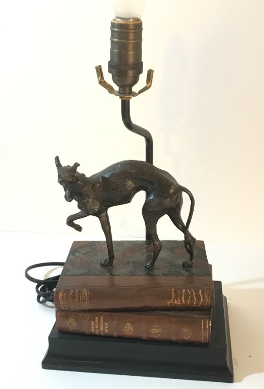 Photo 1 of VINTAGE BRONZE GREYHOUND ON STACK OF ANTIQUE BOOKS. 9”x 7”x 16”