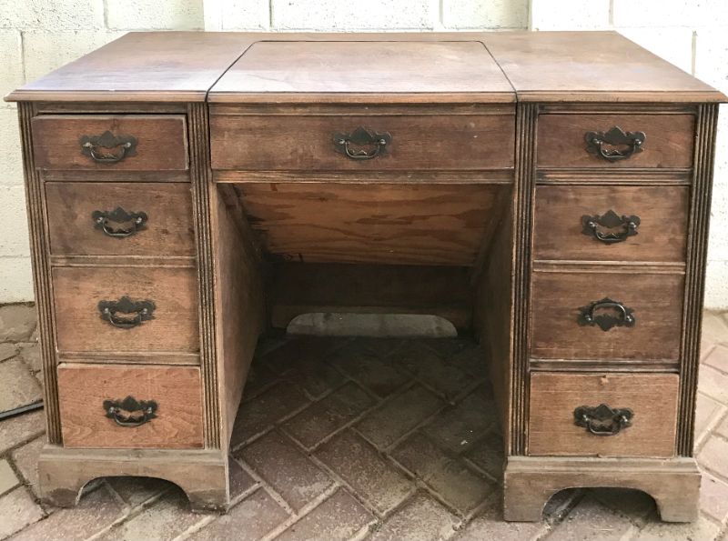 Photo 1 of ANTIQUE WOODEN SEWING TABLE
44” X 22” X 29” 