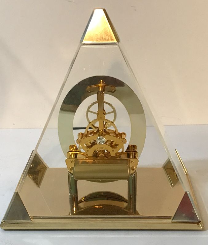 Photo 1 of SEIKO PYRAMID SKELETON DESK/MANTLE CLOCK QUARTZ MOVEMENTS BRASS ACCENTS

