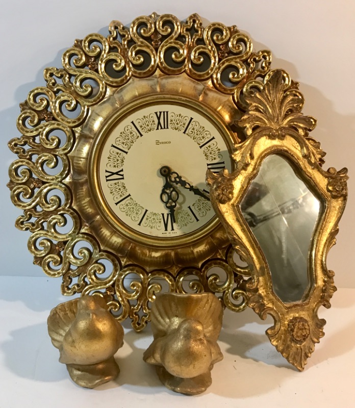 Photo 1 of VINTAGE ORNATE SYROCO
CLOCK MADE IN USA
16” ACROSS
MIRROR & BIRDS