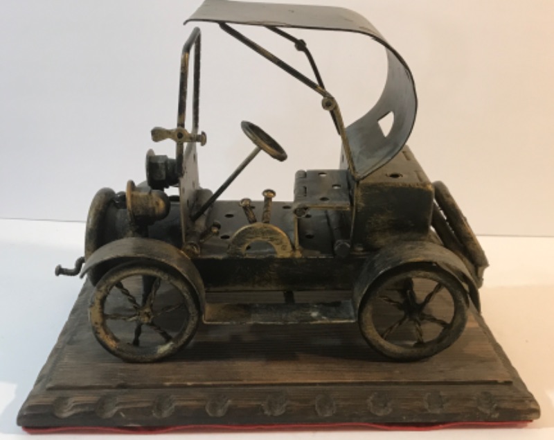 Photo 1 of VINTAGE METAL CAR DECORE MOUNTED ON WOOD
 10”X 12”