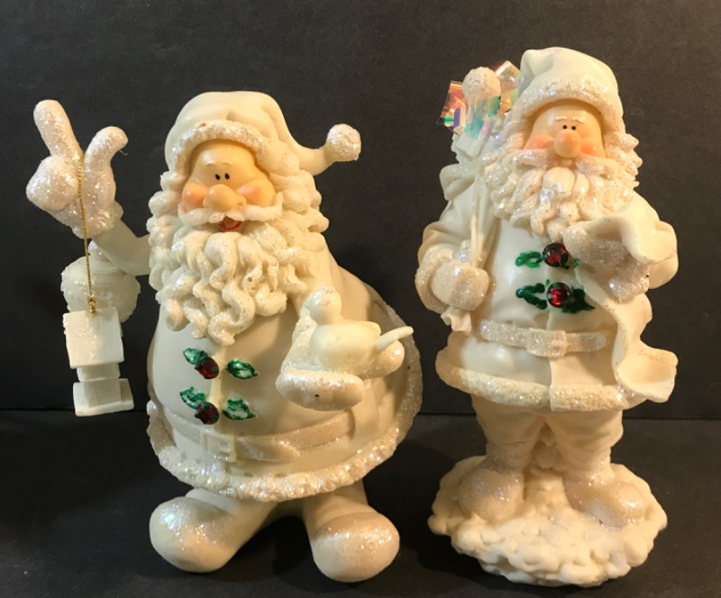 Photo 1 of DON MECHANIC ENTERPRISES SANTA FIGURINES -RESIN
H-8”