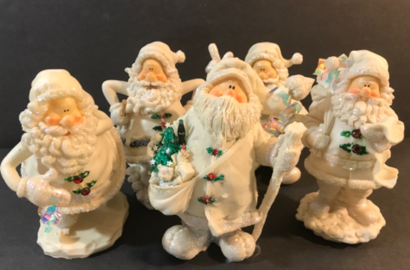 Photo 1 of DON MECHANIC ENTERPRISES SANTA FIGURINES -RESIN
H-8”