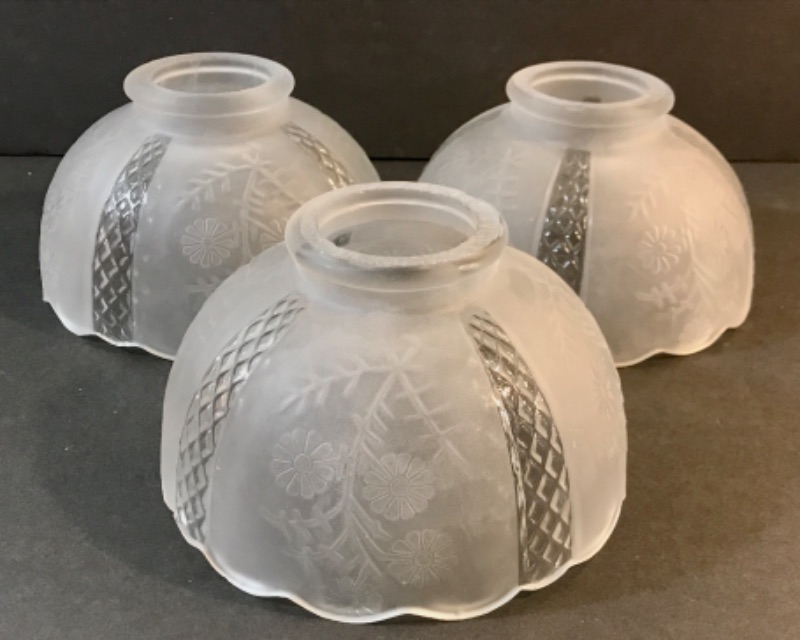 Photo 1 of FROSTED & CLEAR GLASS LAMP SHADES 7” AT WIDEST, OPENING IS 2” W