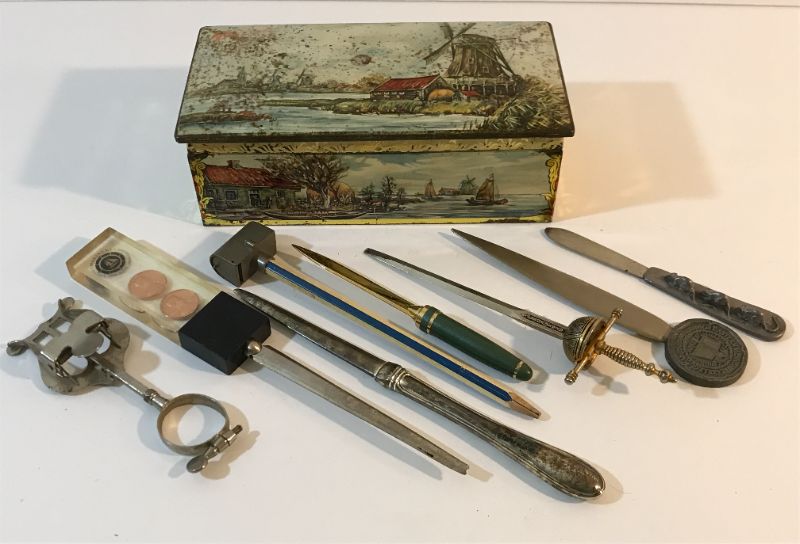 Photo 1 of ANTIQUE LETTER OPENERS IN DECORATIVE TIN WITH HOLLAND LANDSCAPE MOTIF.