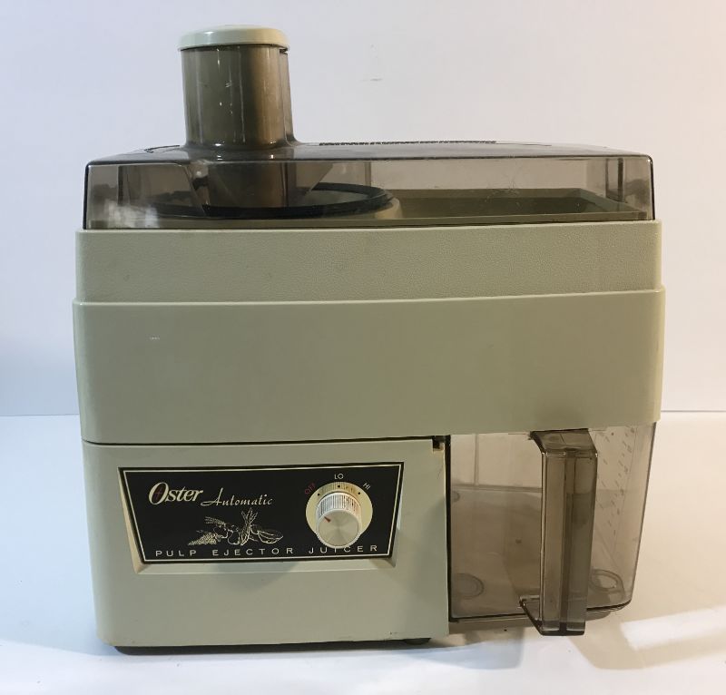 Photo 1 of MID-CENTURY OSTER AUTOMATIC PULP EJECTOR JUICER.