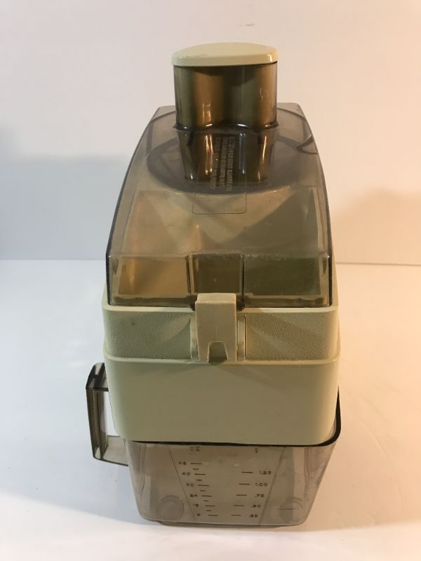 Photo 4 of MID-CENTURY OSTER AUTOMATIC PULP EJECTOR JUICER.