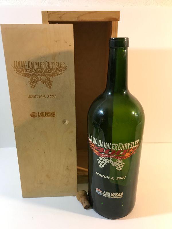 Photo 1 of UAW-DAIMLER CHRYSLER LAS VEGAS SPEEDWAY 2001 CELEBRATORY CHAMPAGNE BOTTLE WITH ORIGINAL WOOD CASE.