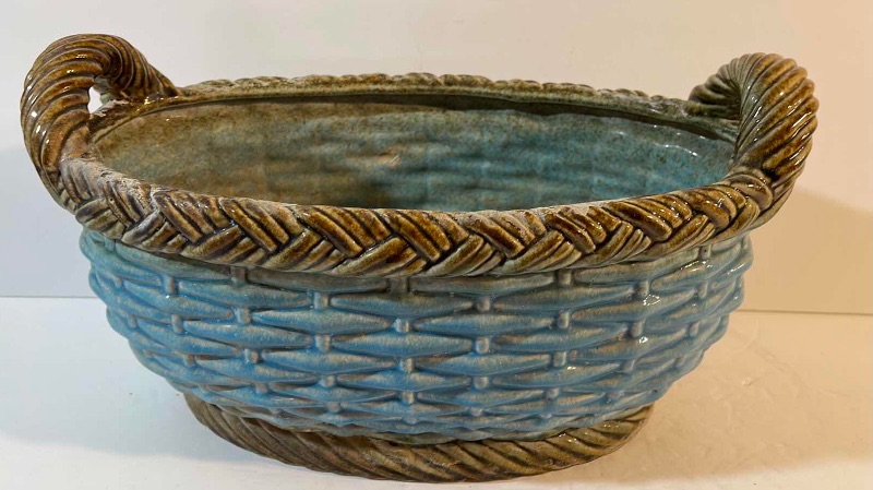 Photo 2 of VINTAGE CERAMIC POTTERY WOVEN LARGE BASKETS WITH HANDLES 
BLUE - 14.5”x8.5”x9” 
ORANGE- 12”x9”x9”