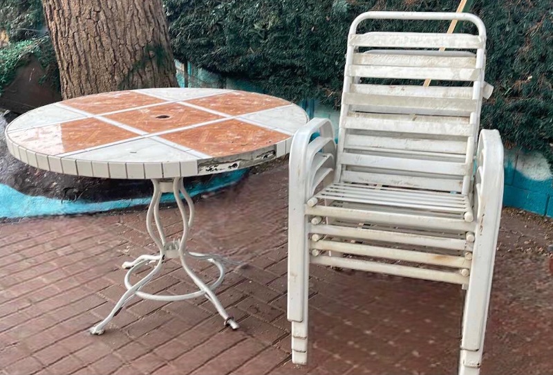 Photo 1 of OUTDOOR TILED TOP TABLE & 4 CHAIRS  NEED TLC 