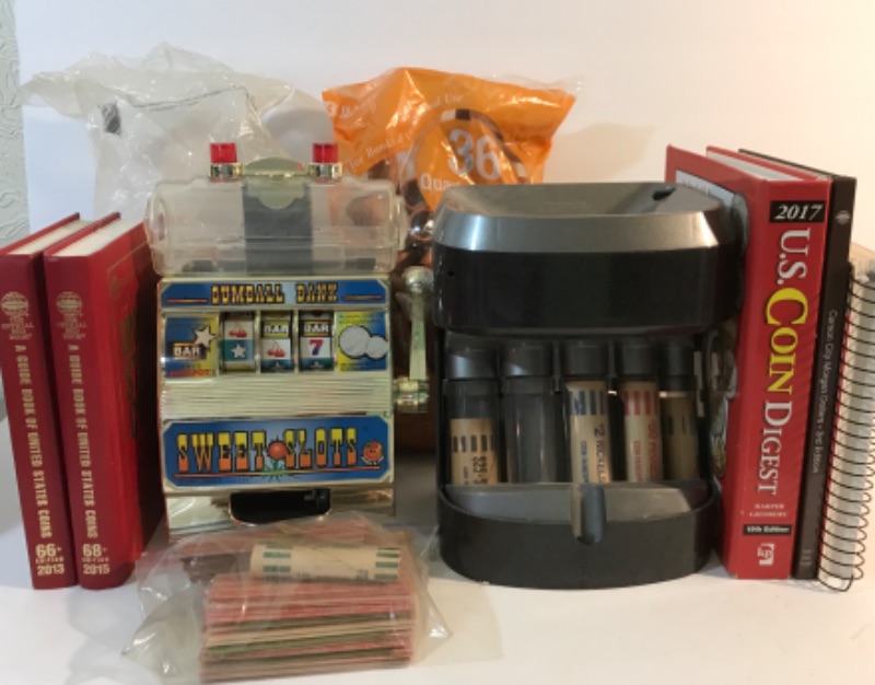 Photo 1 of COIN COUNTER , COIN PAPERS AND BOOKS AND A GUMBALL BANK SLOT MACHINE