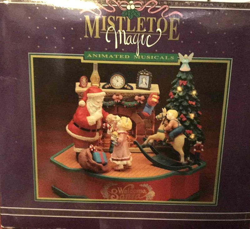 Photo 2 of CHRISTMAS VILLAGE COLLECTABLES AND MISTLETOE MAGIC PORCELAIN FIGURINES