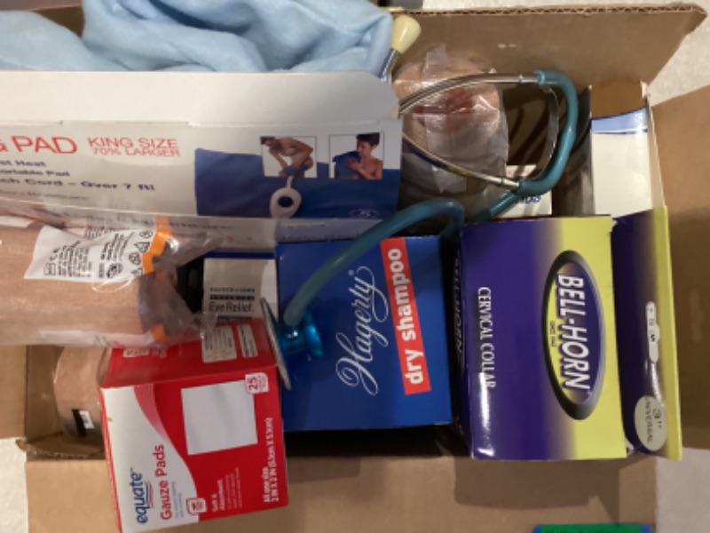 Photo 1 of HEATING PAD, CERVICAL COLLAR & ASSORTED FIRST AID SUPPLIES