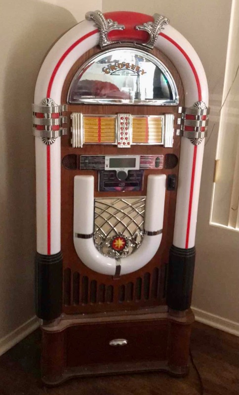 Photo 2 of CROSLEY CR1215A-WA JUKEBOX, INCLUDES AM/FM RADIO & BLUETOOTH RECEIVER & CD PLAYER WITH ST15-WA STAND INCLUDED - WALNUT
26”x16”x57”