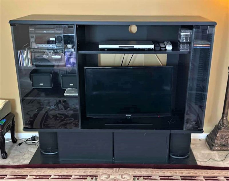 Photo 1 of BLACK ENTERTAINMENT CENTER 58” x 20” x H48” (CONTENTS NOT INCLUDED)