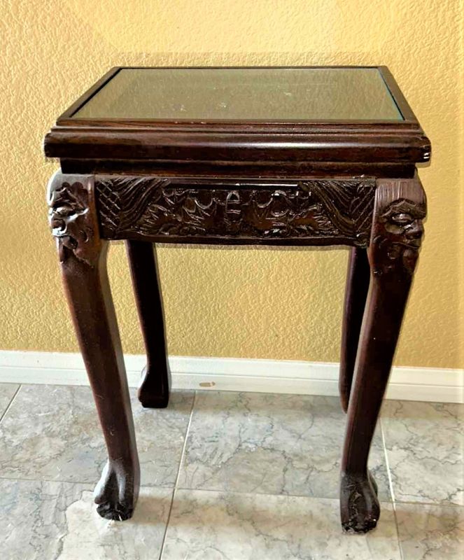 Photo 1 of CARVED WOOD TABLE WITH GLASS TOP, 14 x 10.5 x H21.5