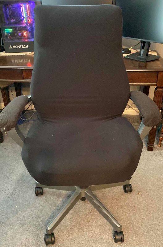 Photo 1 of BLACK DESK CHAIR ON WHEELS