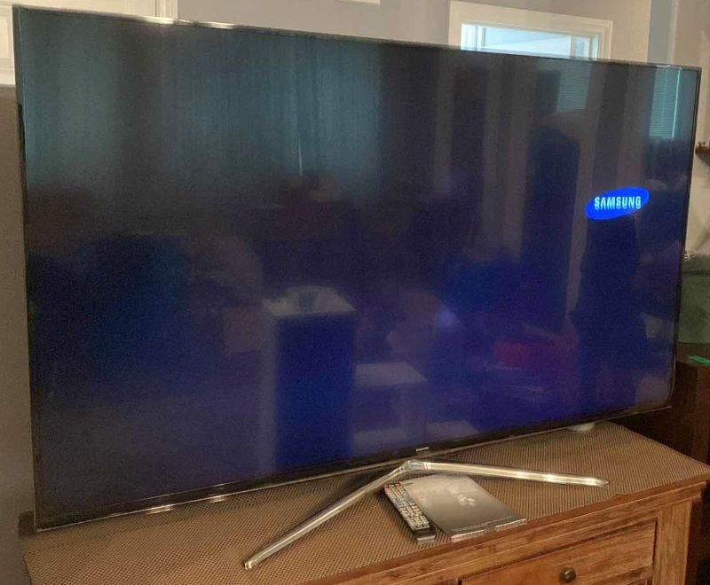 Photo 1 of SAMSUNG 65” SERIES 6 TV WITH REMOTE