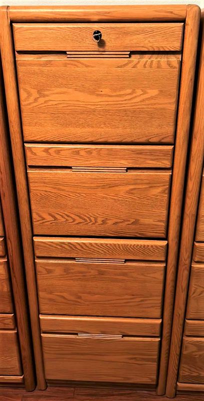 Photo 1 of SOLID WOOD LOCKING FILE CABINET WITH KEY 21” x 25” x H 55” includes file folders