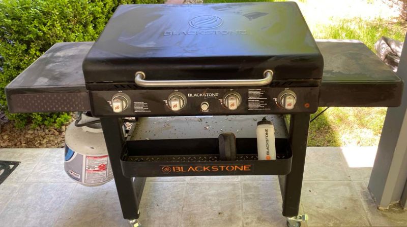 Photo 1 of BLACKSTONE 4 BURNER FLAT GRILL MODEL 1932 WITH PROPANE TANK WITH COVER $499