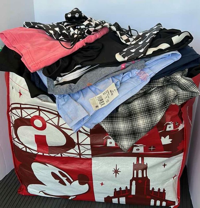 Photo 1 of LARGE BAG FULL OF MISC CLOTHING, ASSORTED SIZES (SOME NEW WITH TAGS)