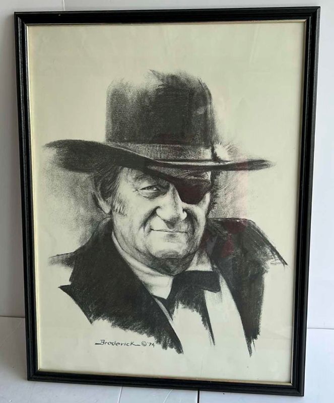 Photo 1 of BLACK FRAMED BLACK AND WHITE JOHN WAYNE ARTWORK BY BRODERICK ‘74 19.5” x 25.5”