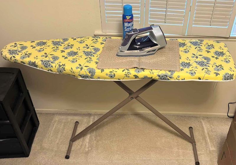 Photo 1 of IRON AND IRONING BOARD